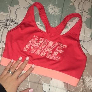 Orange and coral nike sports bra